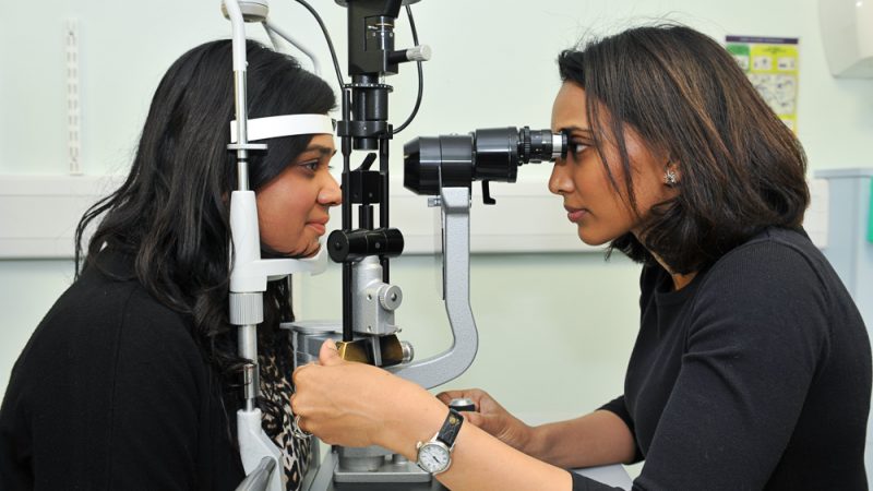 Patient having her eyes checked